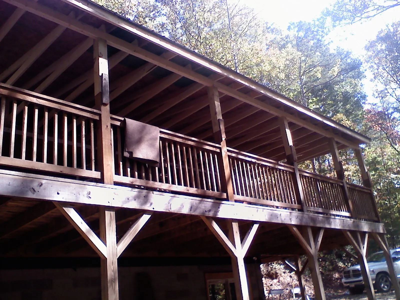 Timber framing under a new elevated porch and deck — Roof Leak Repair in Lisle by Roofing Brothers
